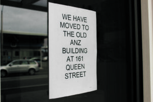 A notice on the MDC building alerts customers to the moving of council offices.