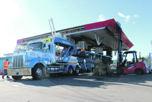 Quality Demolition & Contracting Ltd loading the service station's badly damaged canopy onto a truck for removal. PHOTO/HAYLEY GASTMEIER