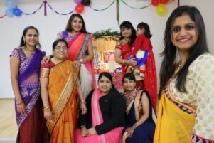 From left, Divya Patel, Chandan Patel, Chetna Patel, Nilam Patel, Divya Patel, Mansi Patel with daughter Veera, 23-months, and Kinnari Patel. PHOTO/HAYLEY GASTMEIER