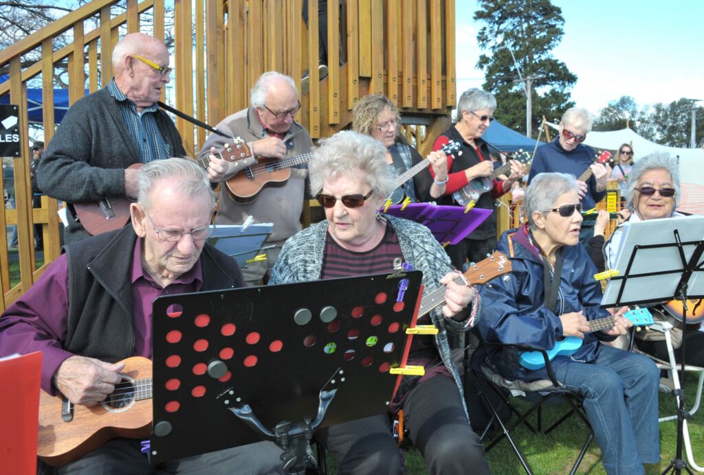 The Silver Ukes of Featherston entertain the crowd at the mini-train gathering. PHOTO/CHRIS KILFORD