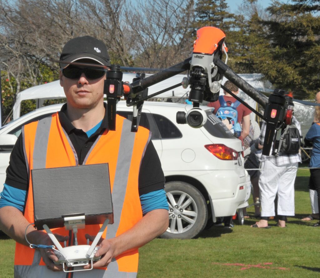 Carterton's Rene Clough of Wairarapa Drone Pilots Group demonstrates one of the flying machines. PHOTO/CHRIS KILFORD
