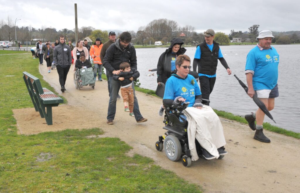 Liz Anderson leads the MND NZ Walk at Henley Lake on Sunday. PHOTO/CHRIS KILFORD