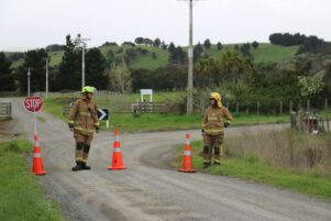 Firefighters assist with road closures in Martinborough following a fatal crash. PHOTO/HAYLEY GASTMEIER