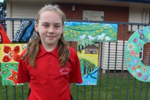 Ariella Perry, 9, helped design and paint the ‘T’. PHOTO/EMILY NORMAN