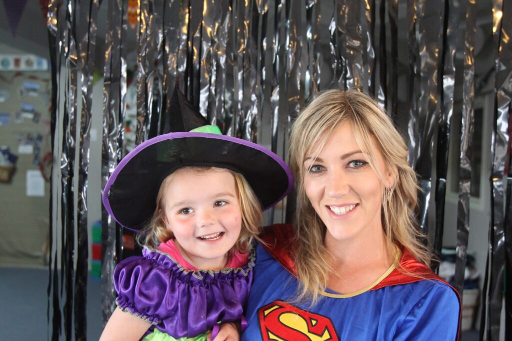 Neveah Brown, 4, with Renee Smith, teacher, celebrate Halloween. PHOTO/BECKIE WILSON
