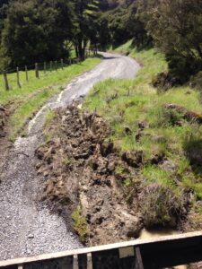 White Rock Rd almost completely covered by a collapsed hillside. PHOTO/SUPPLIED