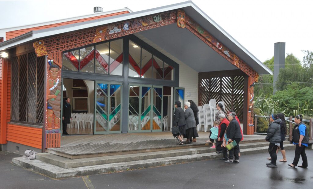 Huria Robens (left) welcomes guests. PHOTO/CHRIS KILFORD