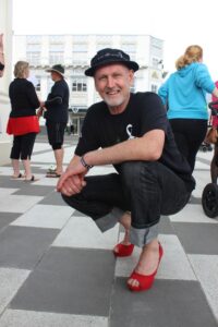 Manager of Stopping Violence Services Wairarapa Jeremy Logan wearing fabulous red heels. PHOTO/EMILY NORMAN