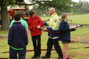 The children got hands on when learning about a career in the fire service. PHOTO/SUPPLIED