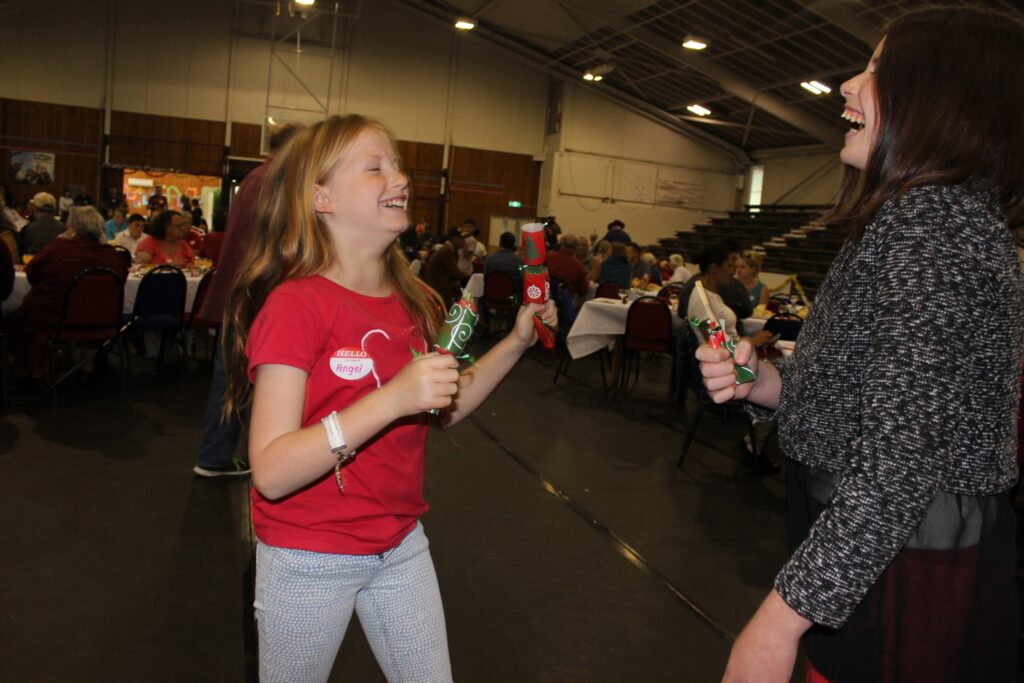 Angel and Michaela Norman of Masterton open their Christmas crackers. PHOTO/EMILY NORMAN