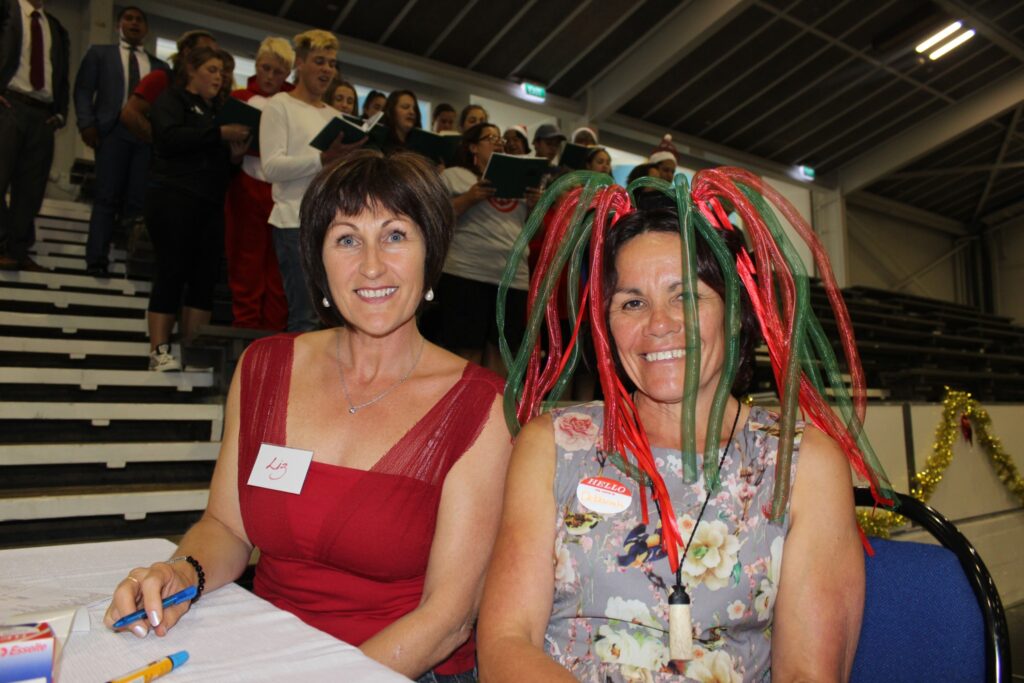 Liz Kirkland, left, and Masterton District Councillor Deborah Davidson take registrations at the door. PHOTO/EMILY NORMAN