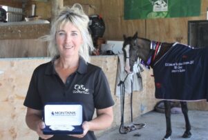 Jenny Champion with the distinctive buckle award given to winners of the 160km event PHOTO/CHELSEA BOYLE