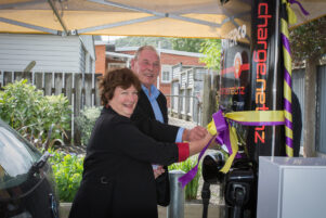South Wairarapa Mayor Viv Napier mans the new electric charging station with Colin Olds, who was a catalyst for seeing it come to the town. PHOTO/FILE