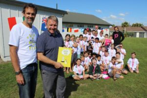 Innovation consultatnt Matt Hart and St Patrick's principal Steve Wheeler, with particpating students and Powershop staff. PHOTO/EMILY NORMAN