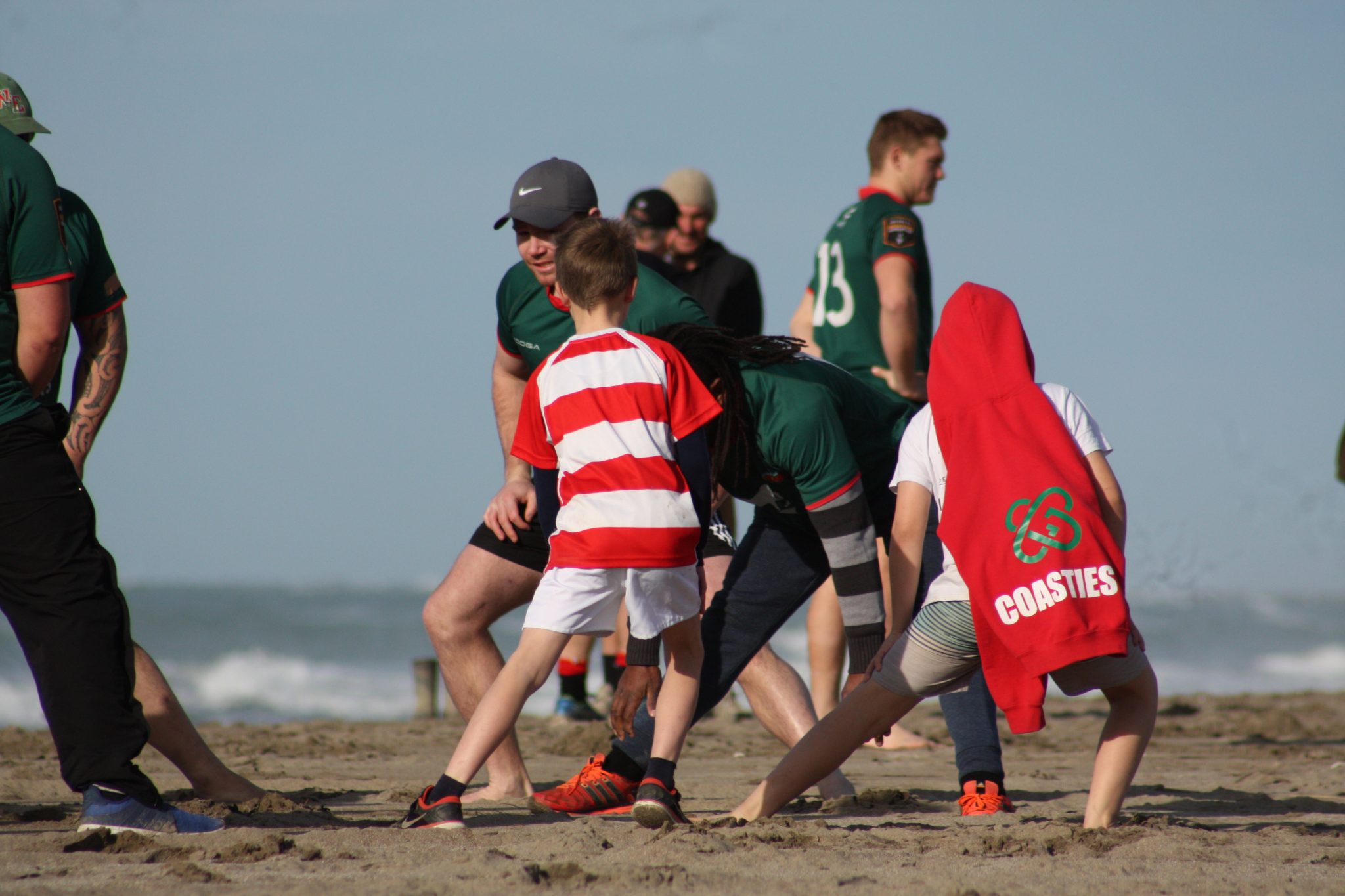 Players stretch before the face-off. PHOTO/KJ LIDDLE