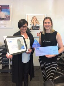 PHB’s Nicci Murphy presents Nicole Brown with her award. PHOTO/SUPPLIED