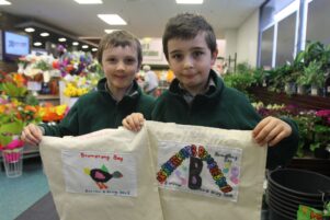 St Patrick's pupils Connor Kube, 8, left, and Lucas Stoneley, 9 show off the boomerang bags. PHOTO/EMILY NORMAN