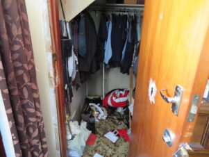 The wardrobe with its broken lock, and gun safe in the back left corner. PHOTO/JAKE BELESKI