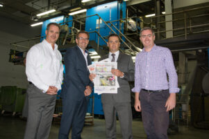 Celebrating the new deal, Webstar operations manager Trevor Howard, left, Webstar chief executive Bernie Roberts, Times-Age publisher Andrew Denholm and the paper's editor, Seamus Boyer. PHOTO/JADE CVETKOV