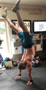 Martinborough’s CrossFit trainer Matt Guild handstand walking. PHOTO/SUPPLIED