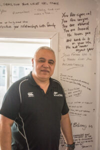 Wayne shares the messages which are written on the walls of the crisis accommodation for youth. PHOTO/JADE CVETKOV