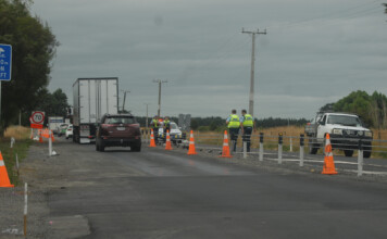 ‘Improvements’ rankle motorists Police at the scene of a crash into the new barrier on SH2. PHOTO/FILE